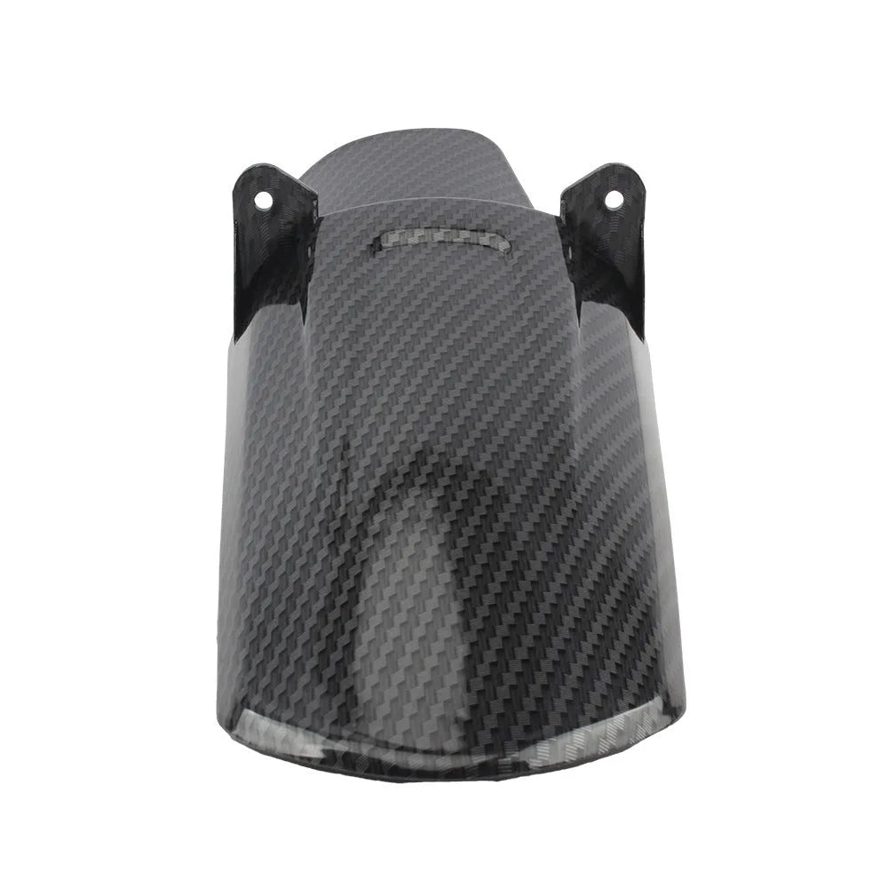 Carbon fibre rear shock absorber fender for a light bee scrambling motorcycle.