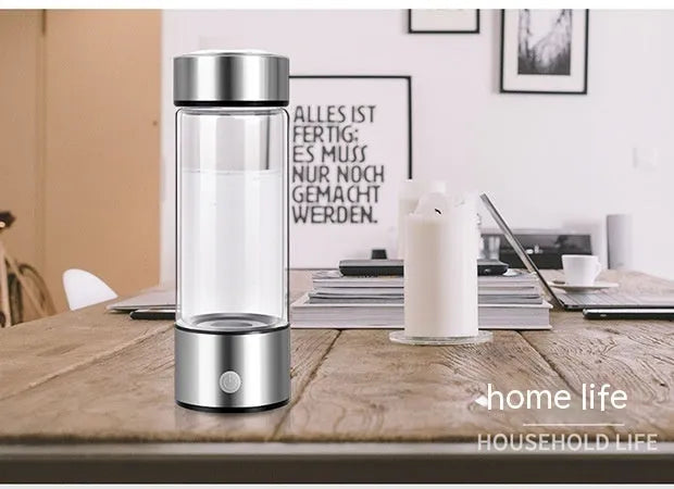 Silver hydrogen water bottle with electric generator and borosilicate glass construction