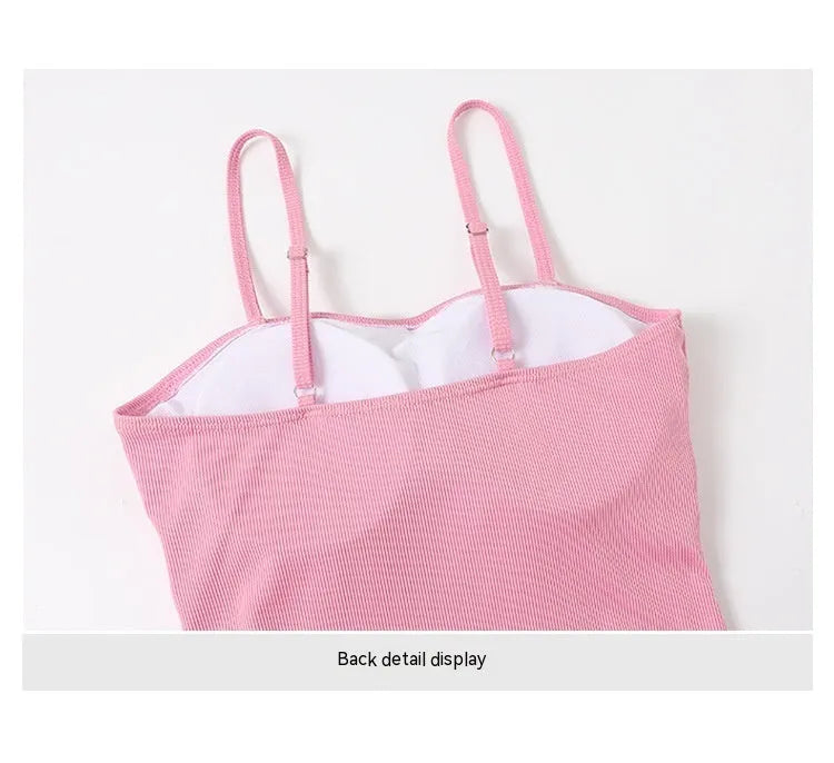 Women's long-sleeved one-piece swimsuit in polyester fabric, available in pink or black colours