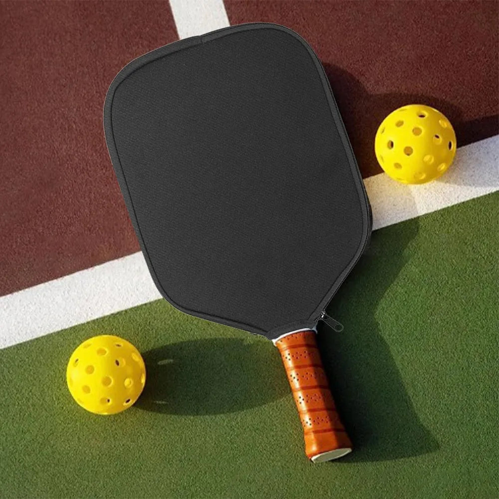 Black neoprene protective sleeve for a table tennis racket on a plain background.