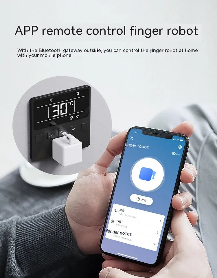 Graffiti smart home Bluetooth finger robot attached to a wall switch, white model