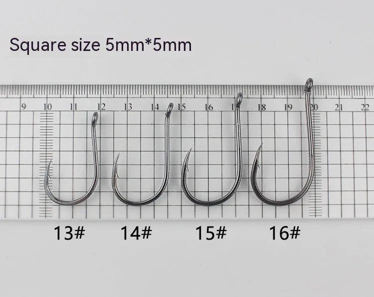 Bulk pack of barbed fishing hooks with crooked mouth and hole ring for sea fishing.