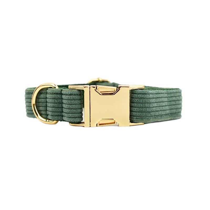Textured corduroy dog collar in light green colour with metal D-ring and plastic buckle clasp.