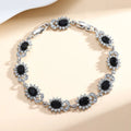 Women's simple zircon bracelet with gemstone inlay in environmental alloy, showing clasp closure and sparkling details