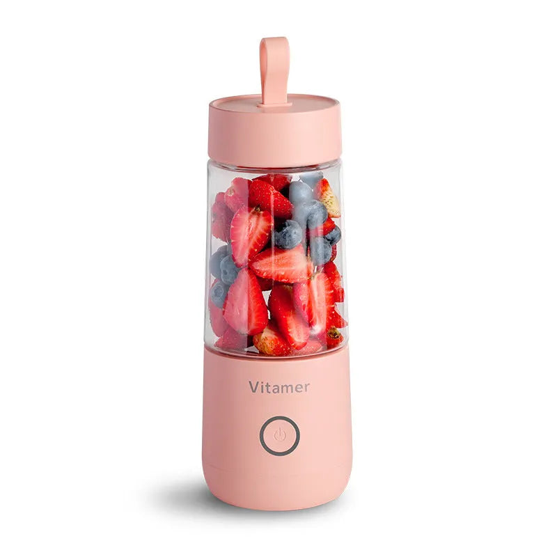 Dreamer Juice Cup portable blender in pink and white with 350ml capacity and stainless steel blade