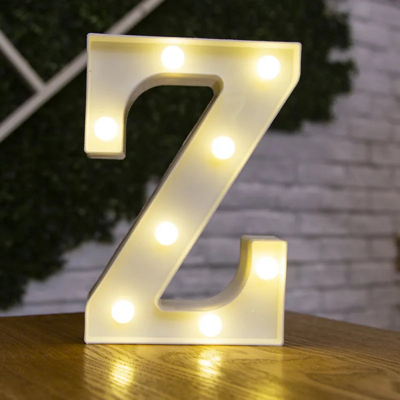 White plastic LED marquee letter sign with warm white glow, 22cm tall