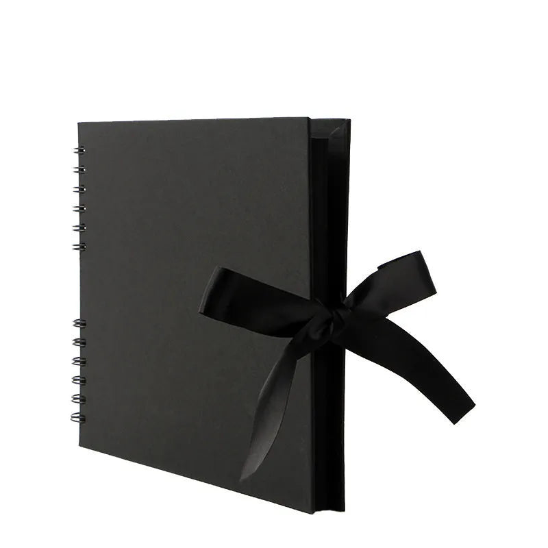 DIY handmade photo album with coil spiral binding in yellow or black cover measuring 290mm by 215mm
