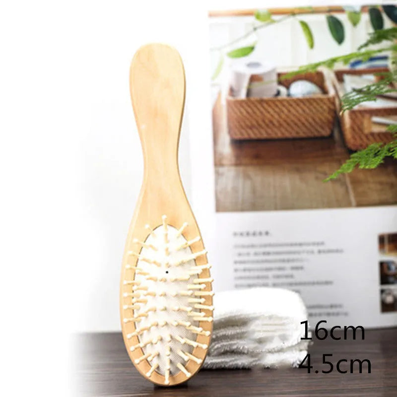 Wooden paddle cushion hairbrush with cushioned bristles, 22cm length for scalp massage and detangling