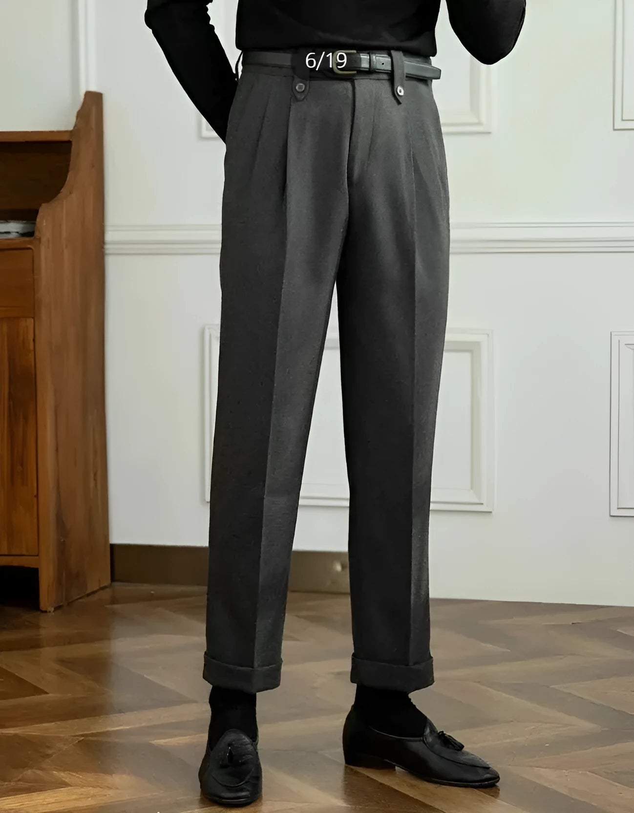 Grey high-waisted straight-leg casual trousers laid flat.