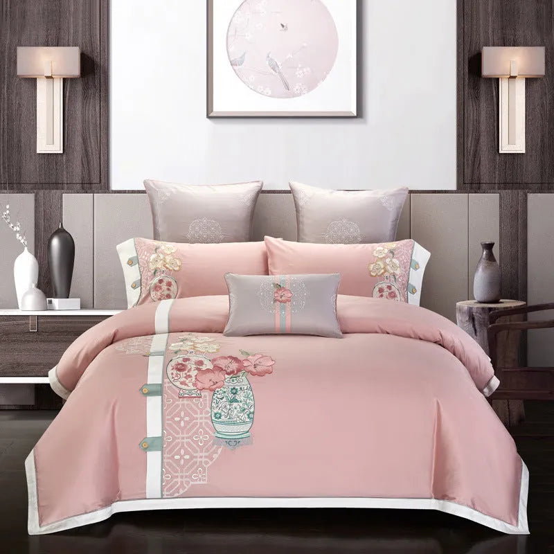Four-piece cotton embroidery bedding set with floral patterns on satin weave fabric