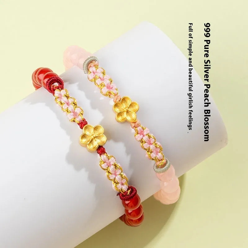 Hand-woven red rope bracelet with diamond shaped crystal and peach blossom Chinese design