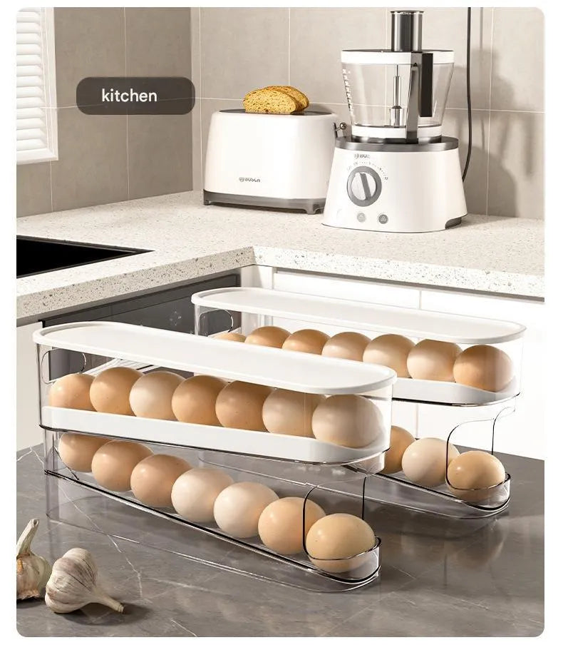 White plastic slide-out egg tray with automatic dispenser on a kitchen countertop