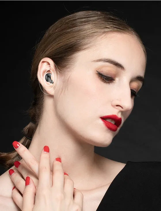 Black and white wireless Bluetooth in-ear headphones with compact charging case