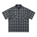 Men's black plaid short sleeve shirt with embroidered letter detail and loose fit design