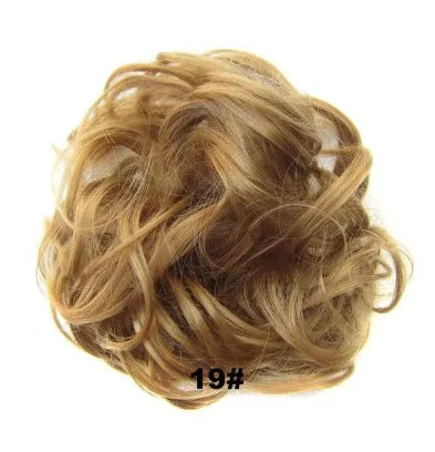 Adjustable hair ring in a natural black shade for creating hair buns and ponytails
