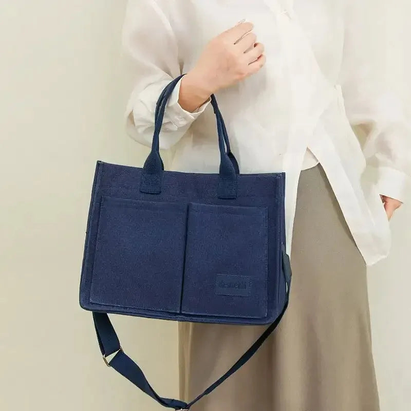 Large capacity canvas tote bag for women with multiple pockets and crossbody strap in creamy white