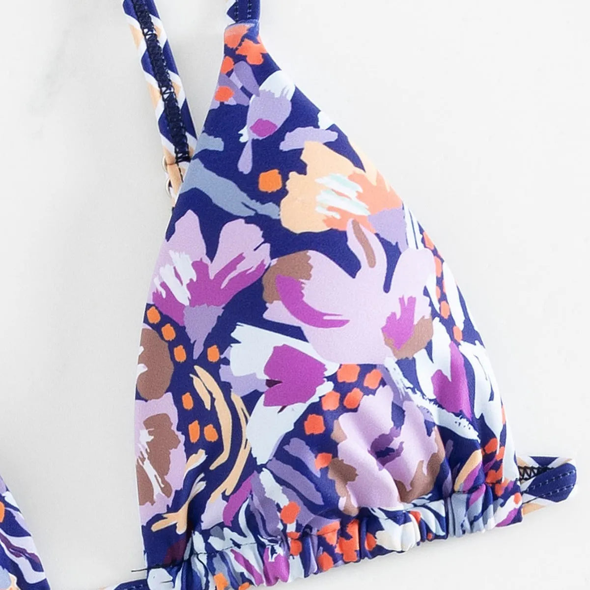 Women's floral print triangle bikini swimsuit with split briefs in polyester fabric