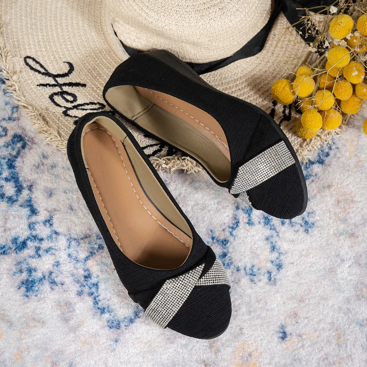 Black women's slip-on casual shoes with round toe, rhinestone detail, and a short chunky heel.