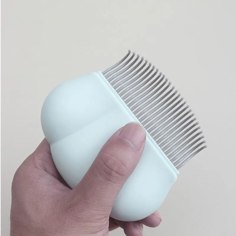 Paw soft deshedding brush for cats and dogs with rectangular blue head and silicone grip.