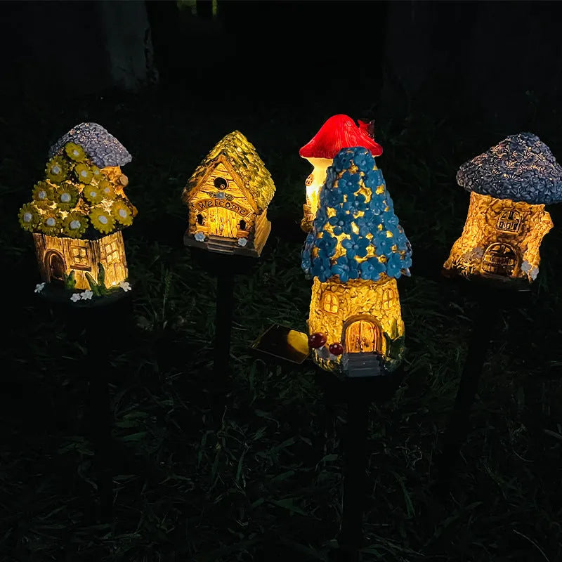 Solar-powered outdoor LED landscape light with flower-shaped resin house design and IP55 waterproof rating