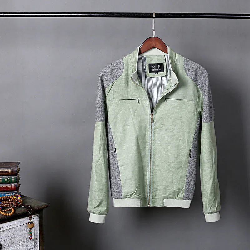 Men's thin blue cotton linen jacket on a hanger, showing regular cut.