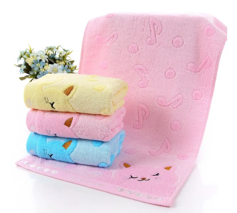 Set of four bamboo fiber kitten face bath towels in blue, green, pink, and yellow, each 25x50cm