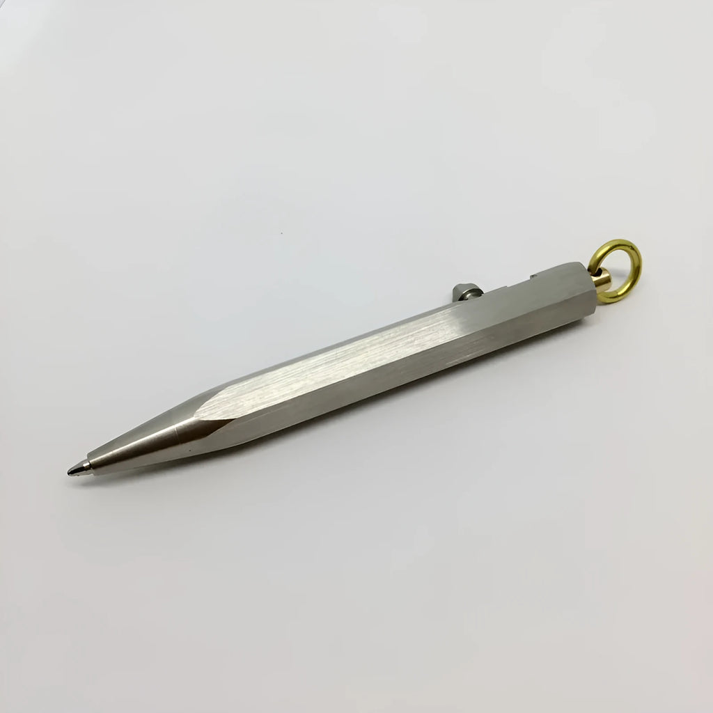 Six-sided stainless steel brass push pen with keychain attachment shown in assorted colours