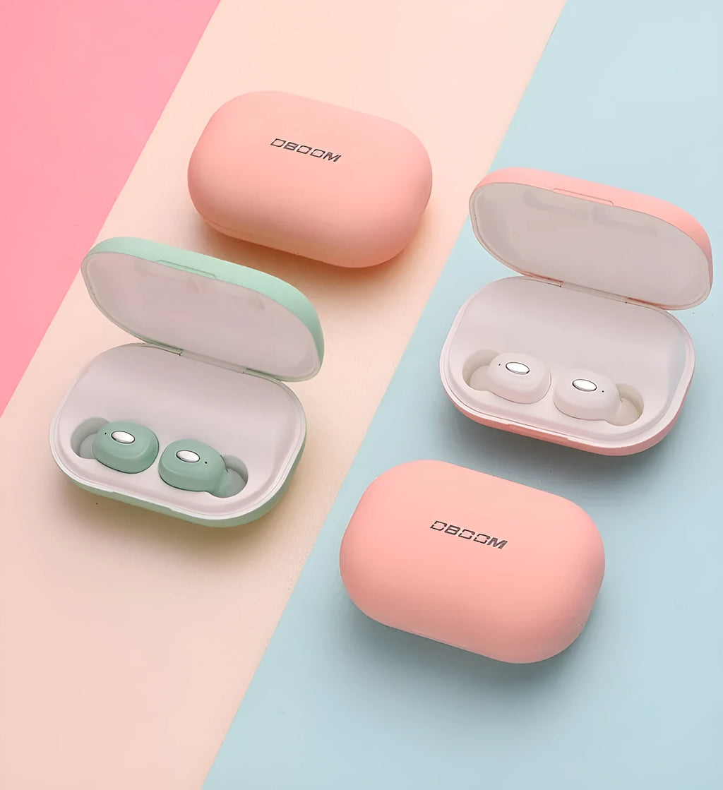 Wireless Bluetooth headset with charging case in blue and pink on white background