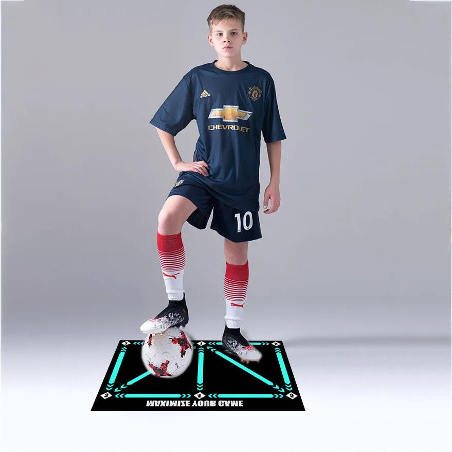 Black non-slip football training mat measuring 60cm by 90cm on a flat surface.