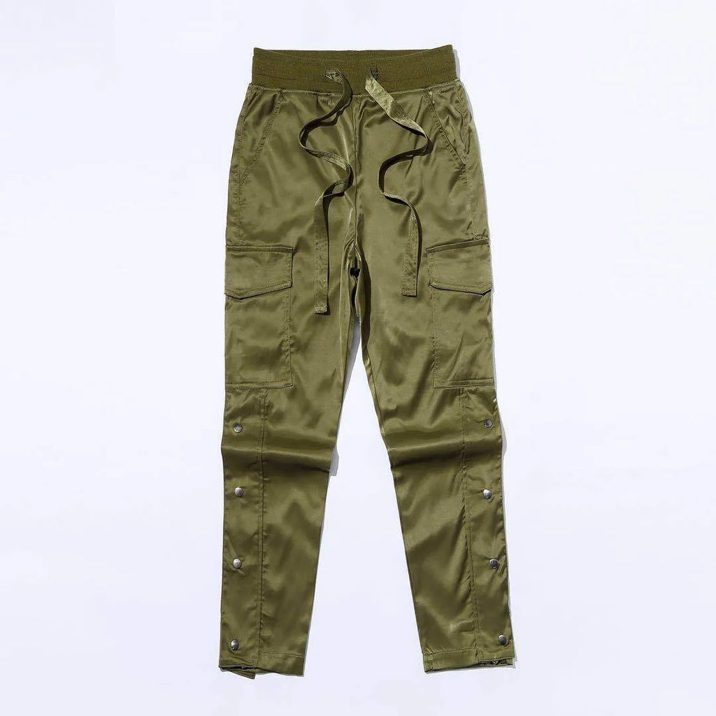 Men's cotton cargo pants with green colour, straight leg, and Velcro button closure on black background