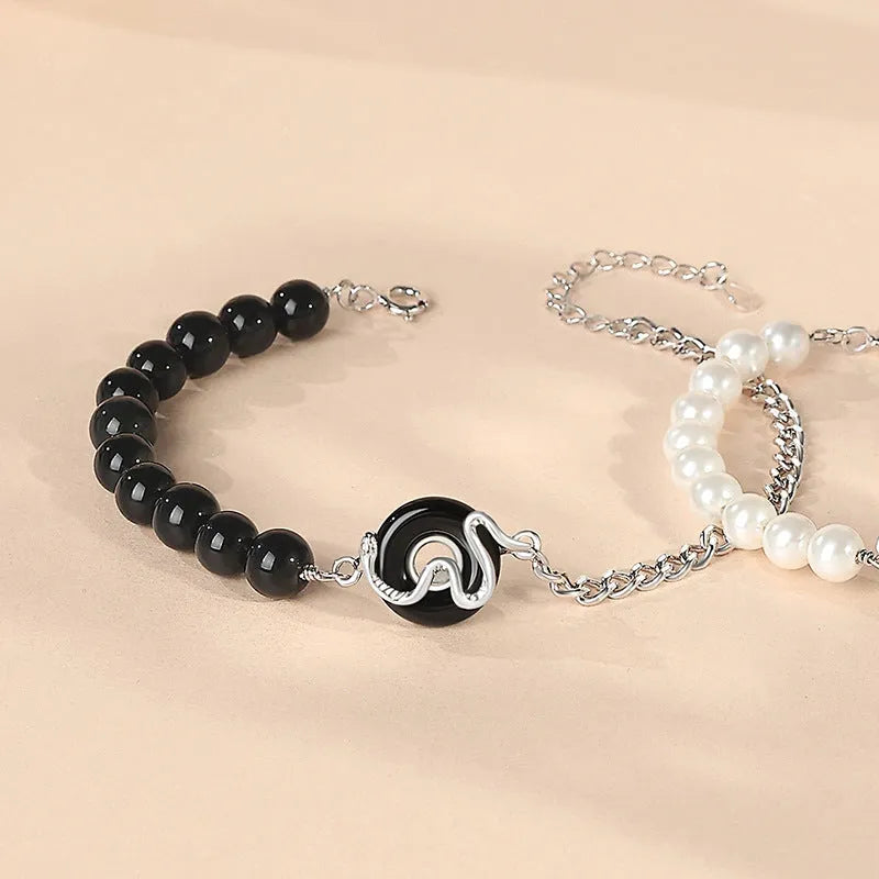 925 sterling silver bracelet with snake zodiac motif, obsidian pearl, and safe buckle in New Chinese style
