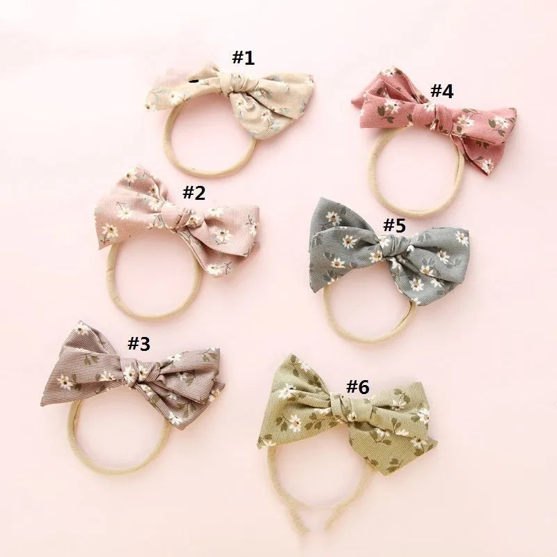 Children's knotted bow hair ring in cloth fabric with printed princess series design