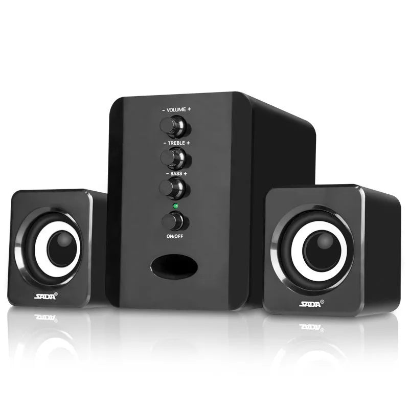 Set of three plastic computer speakers in black: one main unit and two satellite speakers with 3.5mm audio and USB cables