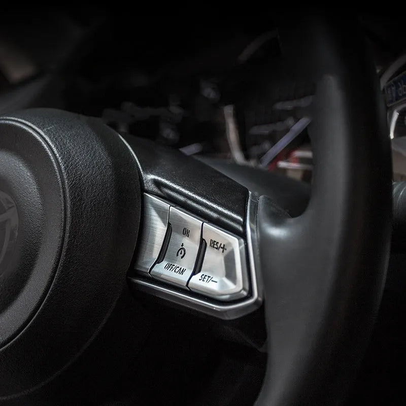 Eight aluminium alloy decorative stickers for car steering wheel in brushed red, silver, and blue finishes