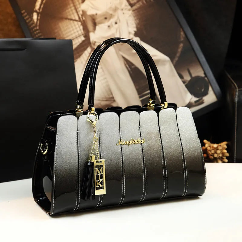 Patent leather all-match handbag 33cm long in glossy finish with silver tone hardware and zipper closure