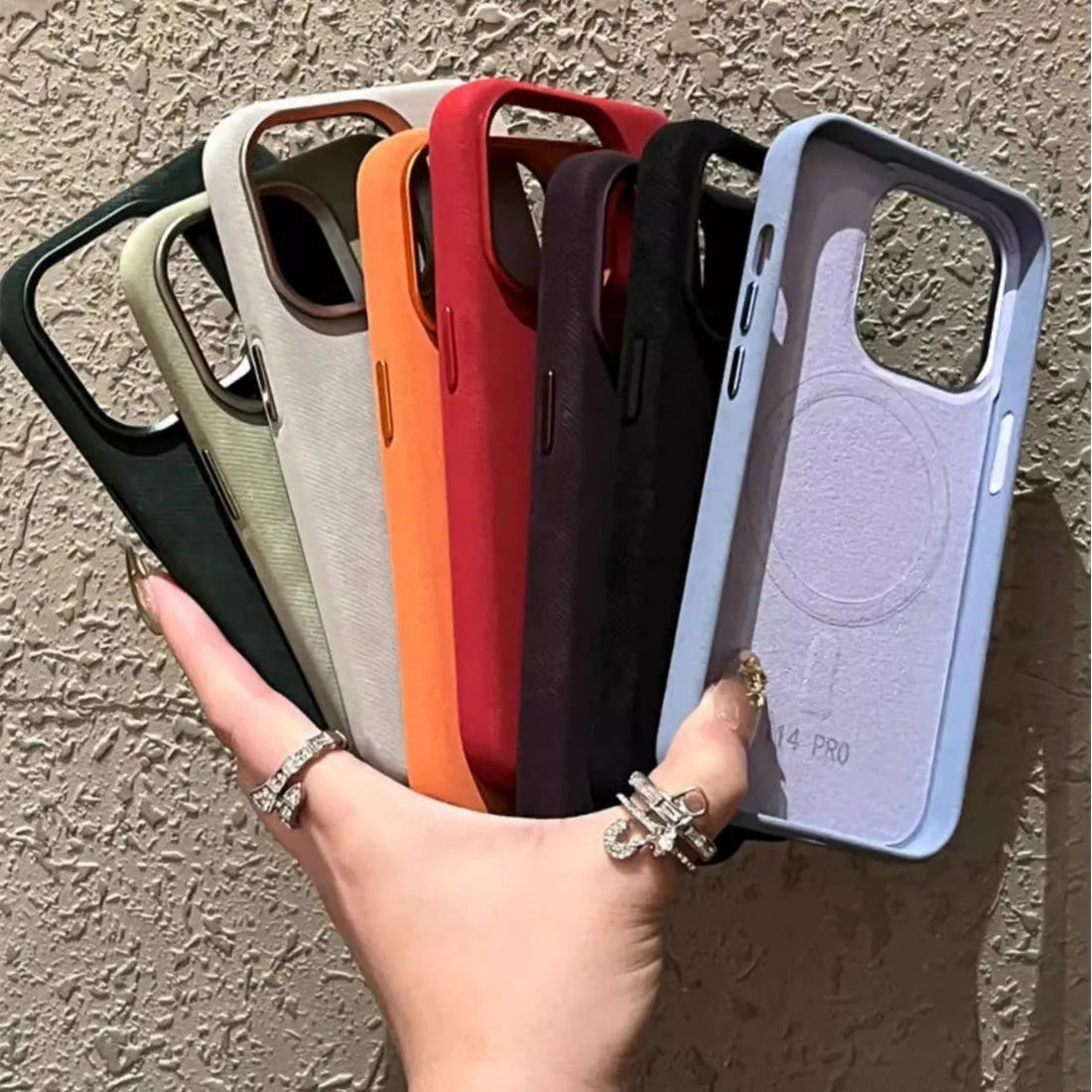 Magnetic velvet flannel hard phone case for iPhone in silver grey colour showing magnetic ring.