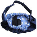 Newborn baby carrier sling with cross-arm one-shoulder strap in blue plaid fabric.
