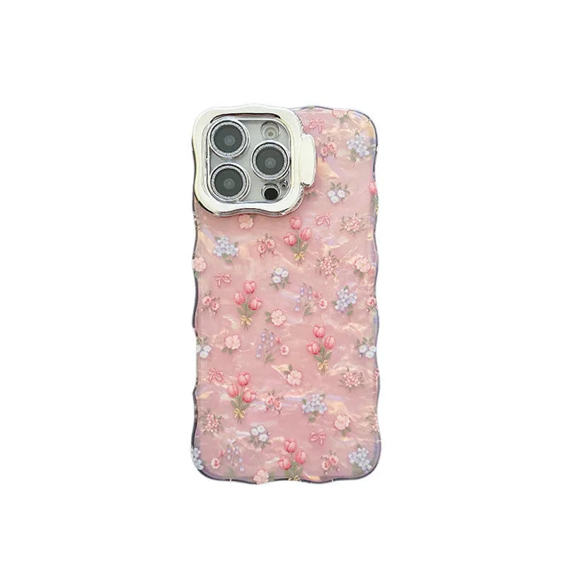 Wave pink acrylic iPhone case with embossed floral shell pattern and invisible brackets