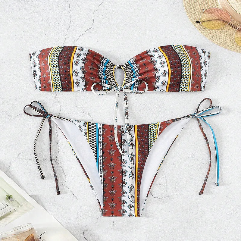 Women's printed lace-up split swimsuit in mixed colour, two-piece set with bra and pants, sleeves design, available in multiple sizes.