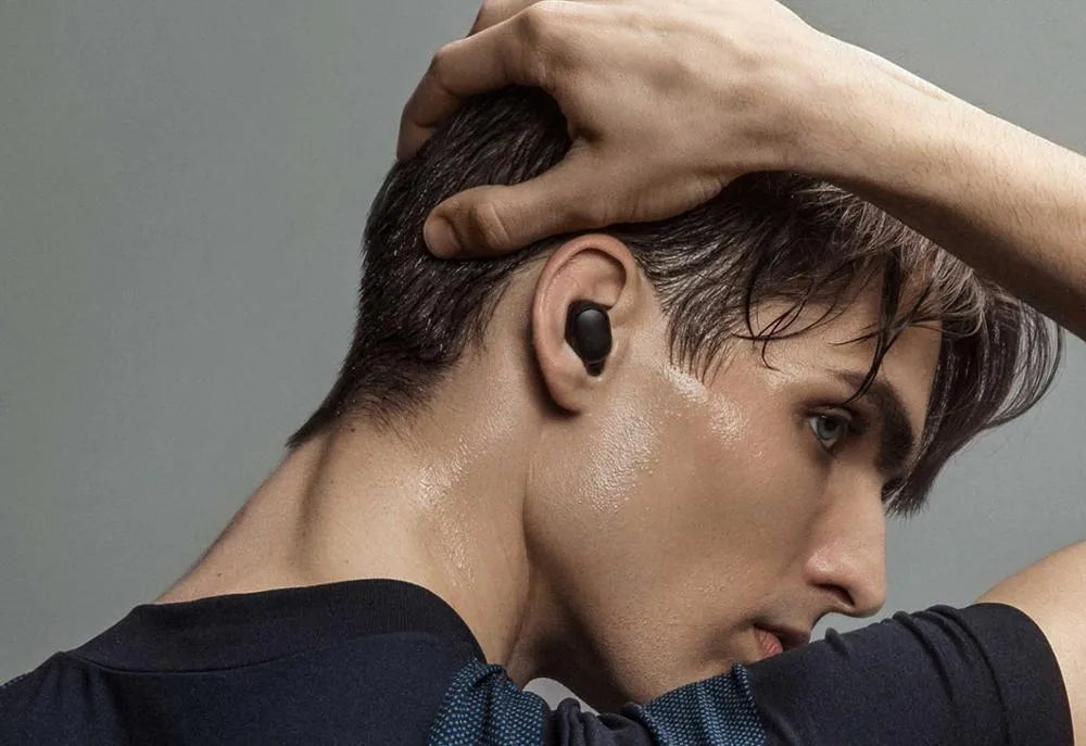 Redmi AirDots 2 black true wireless earbuds and charging case.