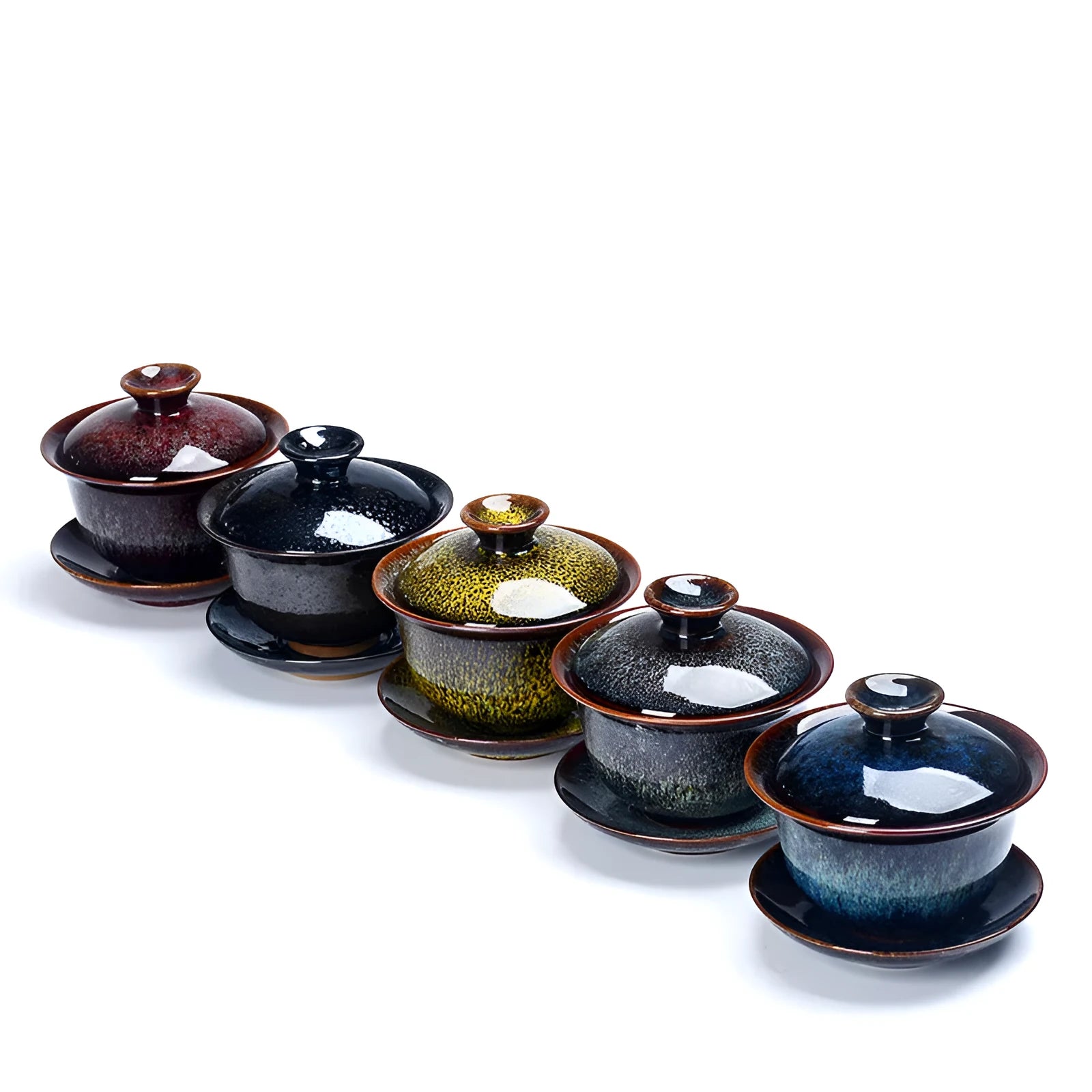 Handcrafted ceramic three-piece tea set with covered bowl and teacup in transmutation glaze finish