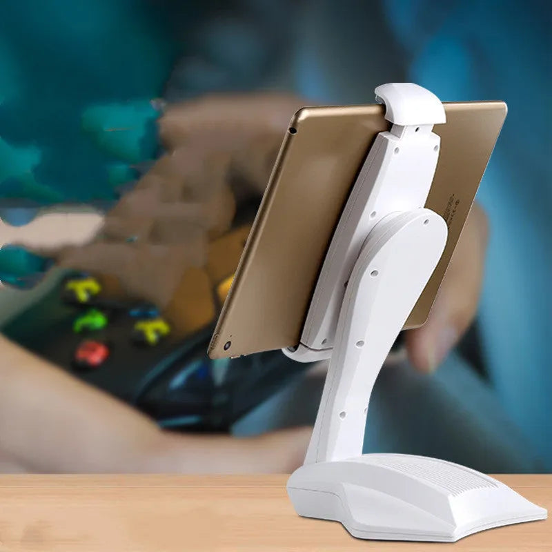 White aluminium tablet stand on a desk, showing its height and the adjustable clip for 7-15 inch devices.