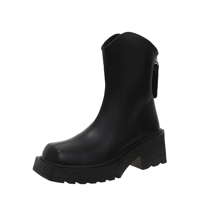 Black platform Martin boots for women with a square toe and back zipper.