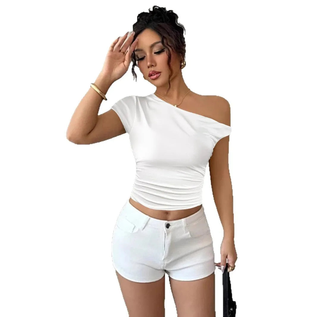Women's white polyester slim fit pullover top with oblique shoulder neckline and raglan sleeves