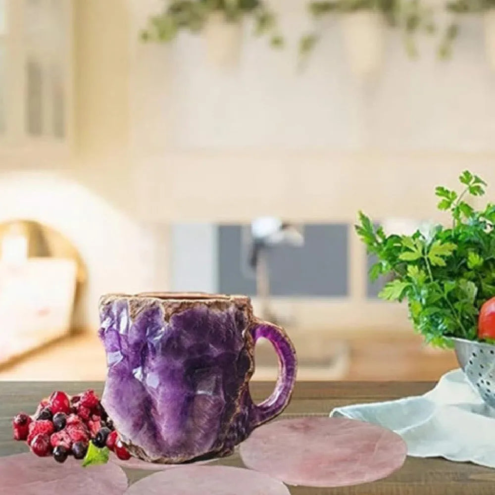 A purple resin coffee mug with a handle, showing a crystal-like structure, on a table.