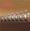 Gold, rose gold, and silver coloured perforated circle zircon stud earrings in various sizes from 5mm to 12mm diameter.