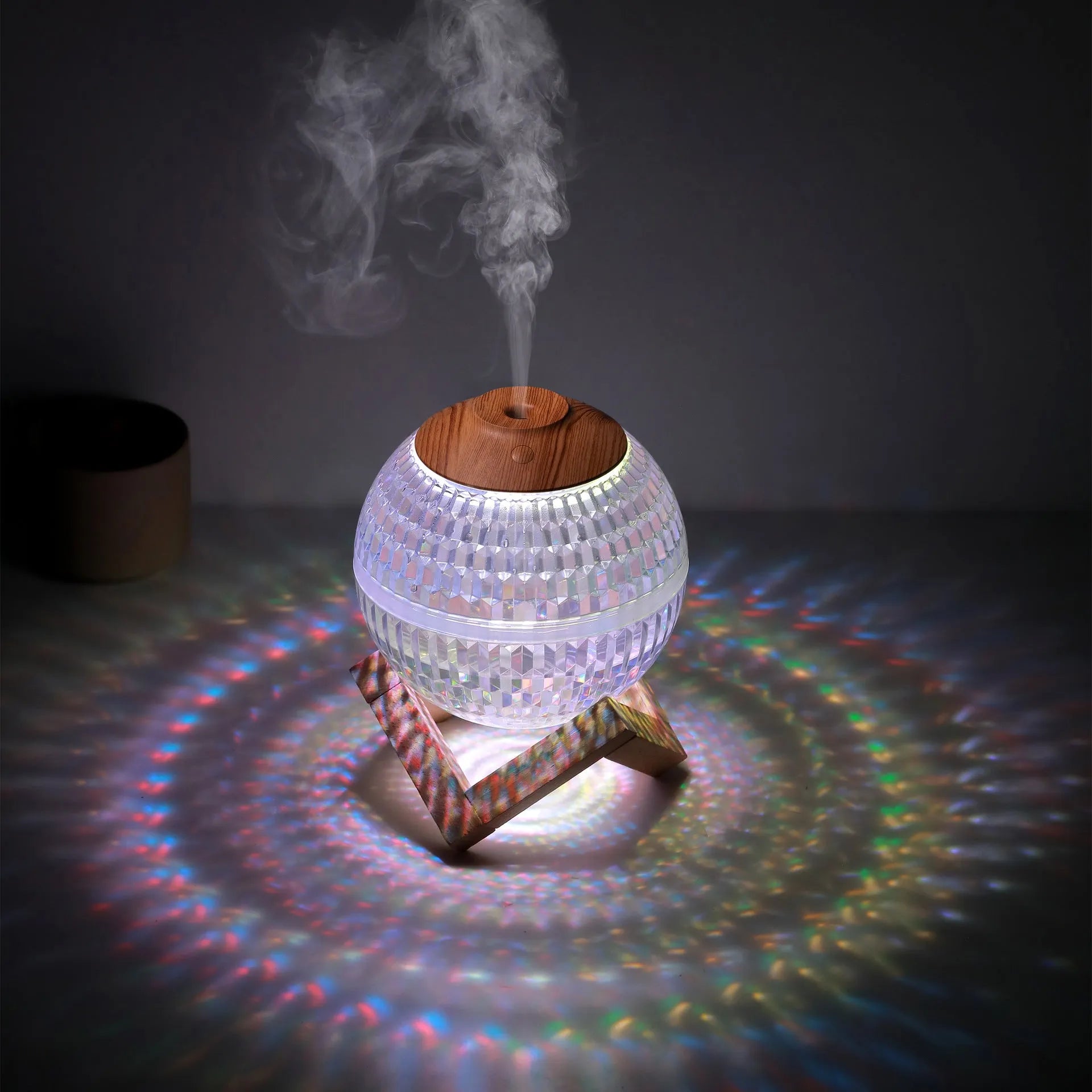 Crystal ball humidifier round 116 mm USB with atmosphere sea light on a desk