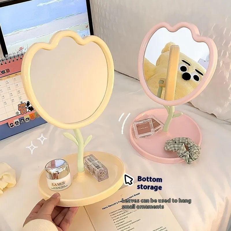 Tulip desktop vanity mirror with plastic frame and glass lens in pink colour, cartoon-style design