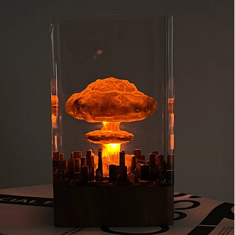 Small resin night lamp shaped like an atomic bomb mushroom cloud in modern simplicity style.
