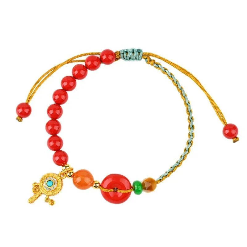 Red cinnabar bracelet with hand-woven geometric peace buckle in national style